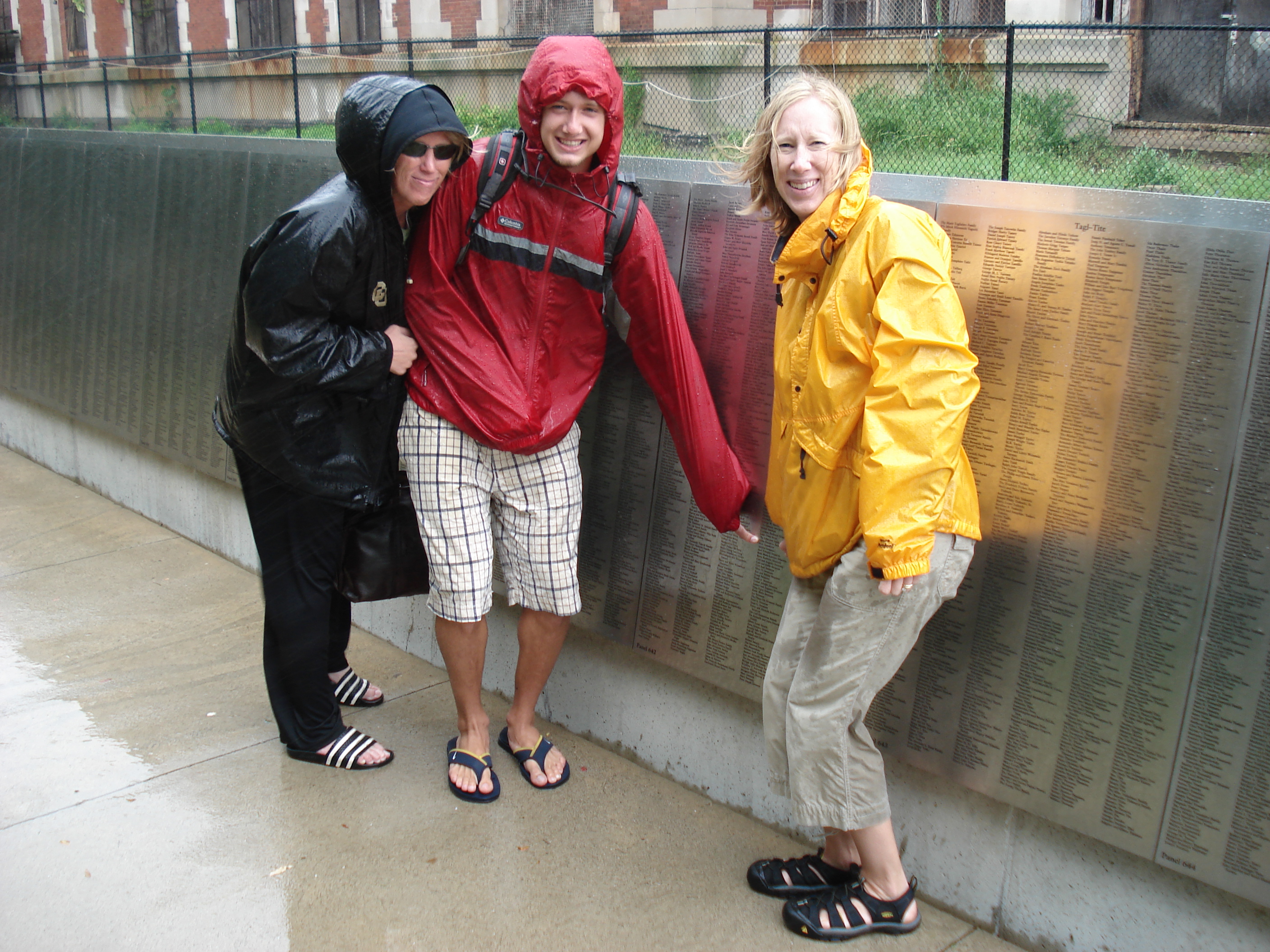 Wendy Swanhorst, John Swanhorst and Jann Engelstad in 2007 at the Wall of Honor near Grandpa Fred and Grandma Erika's inscribed names.  Yes, it was a terribly rainy day!